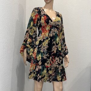 Betsey Johnson  feminine floral dress, fully lined, self tie belt.